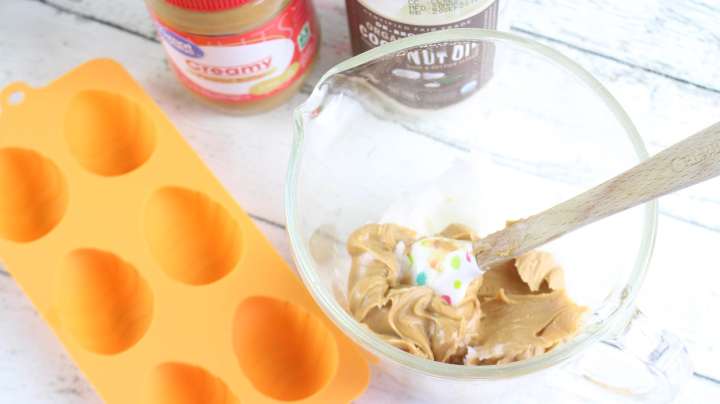 Peanut butter and coconut in a microwave bowl 